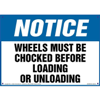 Notice, Wheels Must Be Chocked Before Loading or Unloading Sign