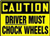 Driver Must Chock Wheels plastic sign